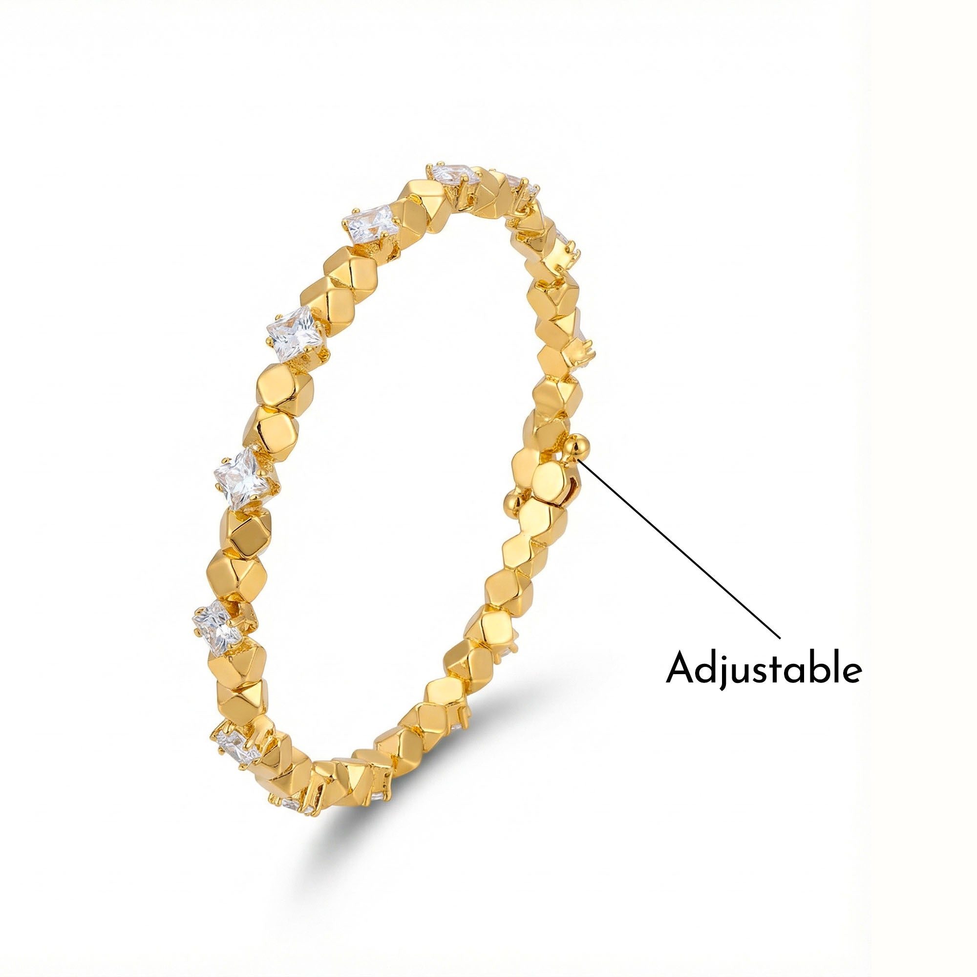 Gold ring with diamond accents on a white background