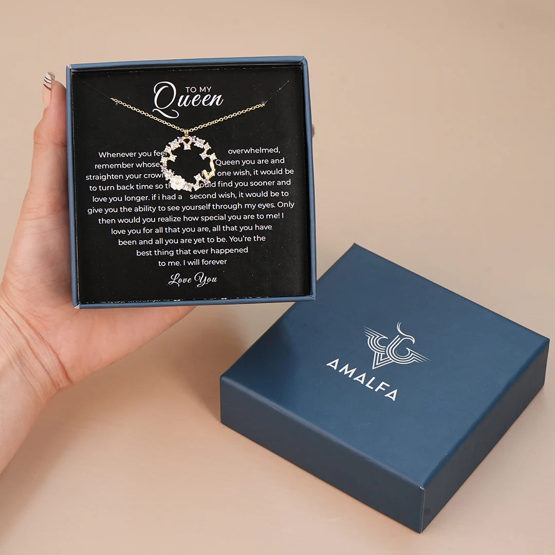 Necklace in a box with 'To My Queen' message and AMALFA branding