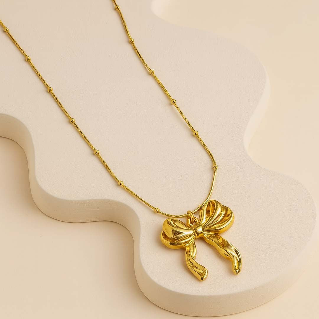 Beaded Bow Pendant Necklace in Gold