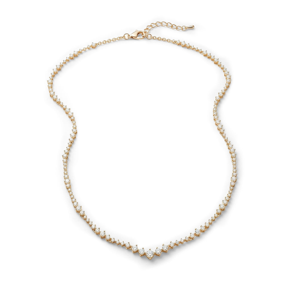 Gold necklace for women with small diamonds on a white background