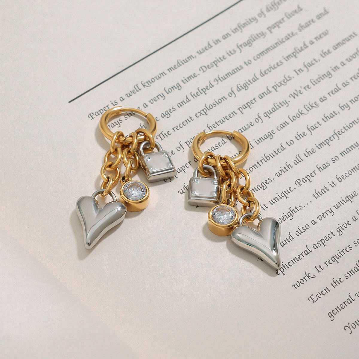 Pair of gold and silver heart-shaped Dangler Earrings
