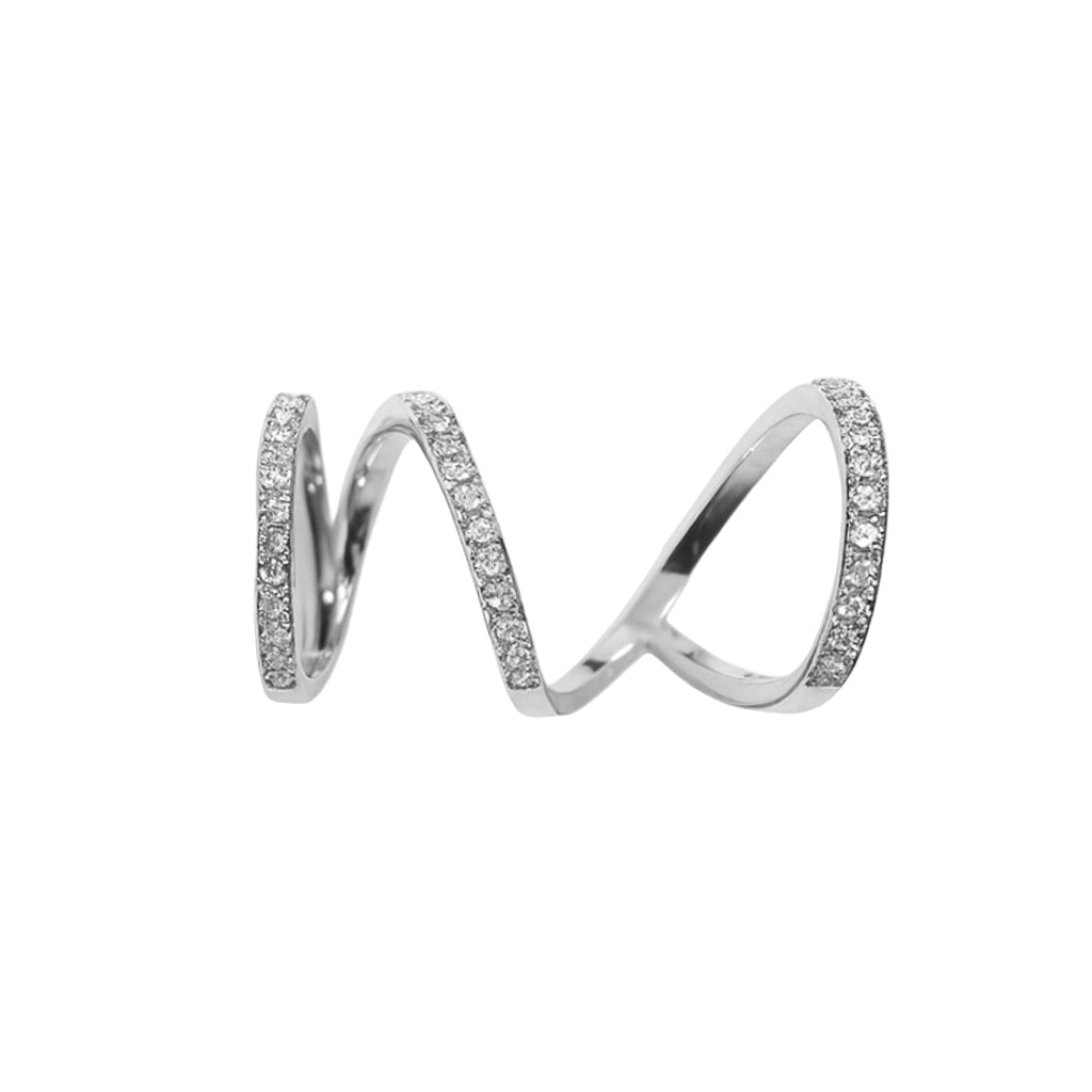 A silver spiral ring adorned with shimmering crystals, styled as a festive Christmas accessory and elegant holiday gift.