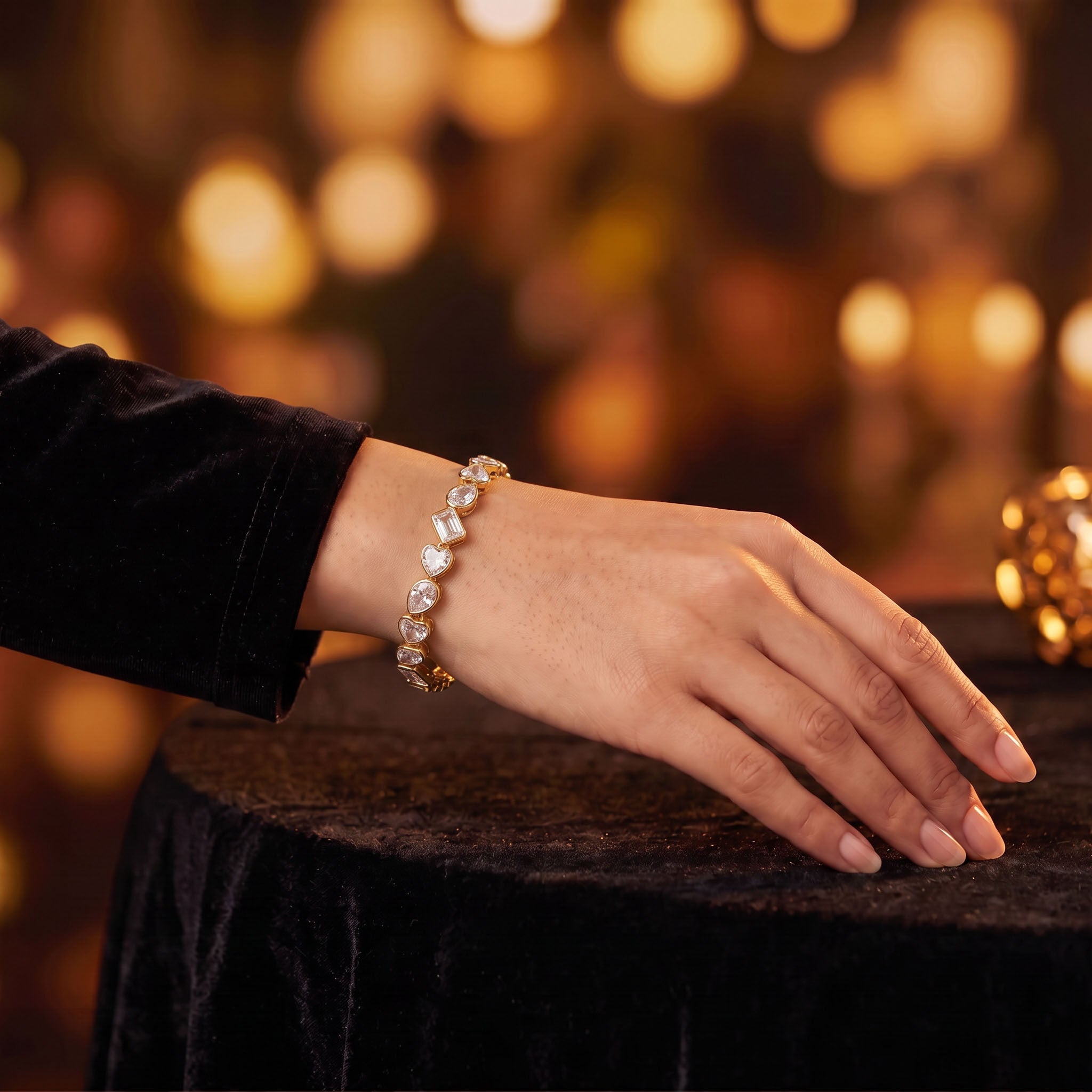 Designer gold bracelet for women featuring mixed-shape crystal stones