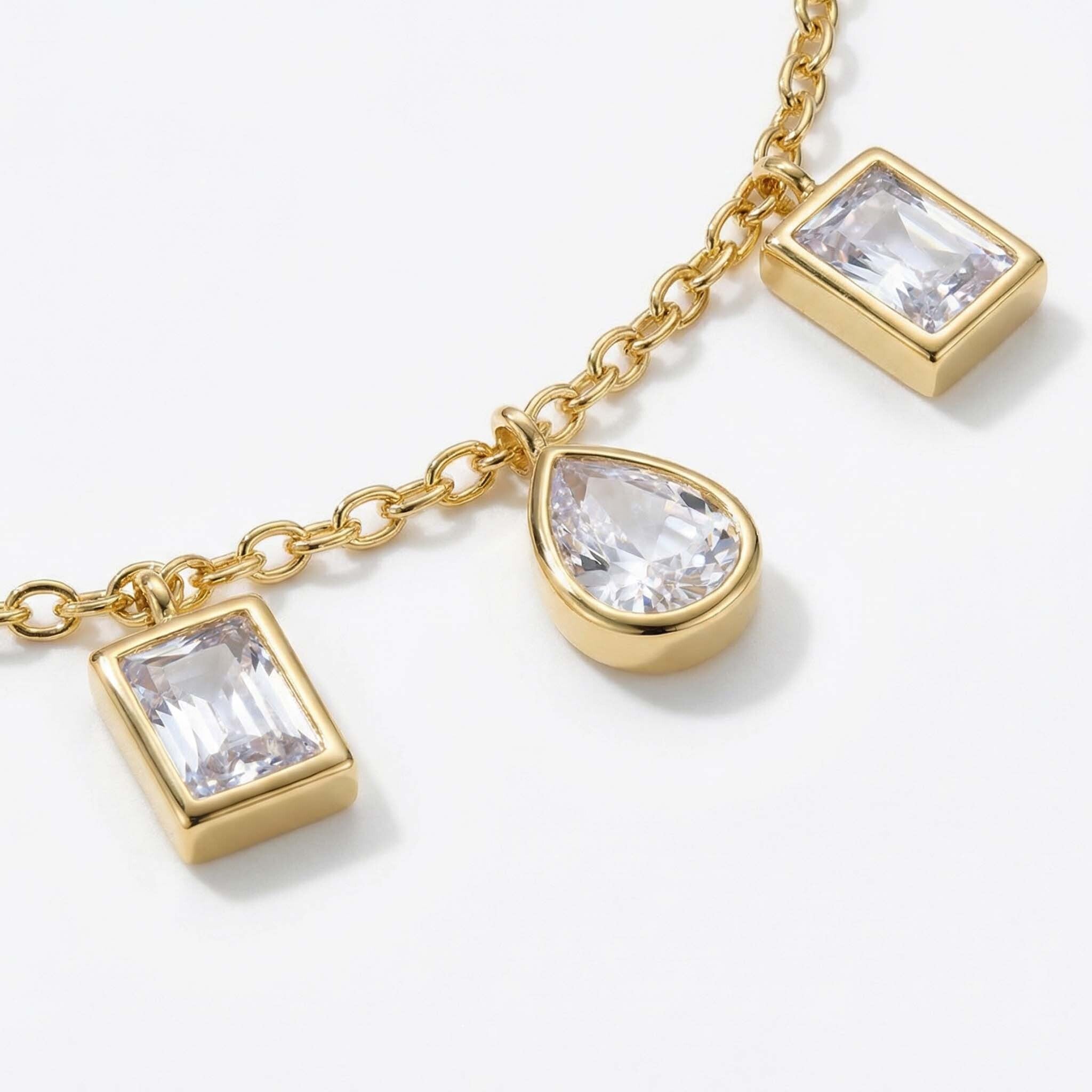 gold double-finger ring three clear gemstone .