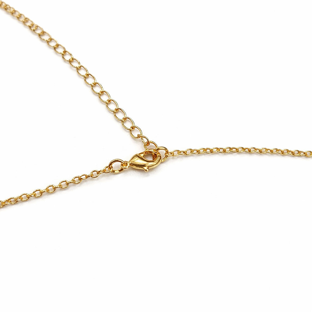 Gold chain necklaces for women on a white background