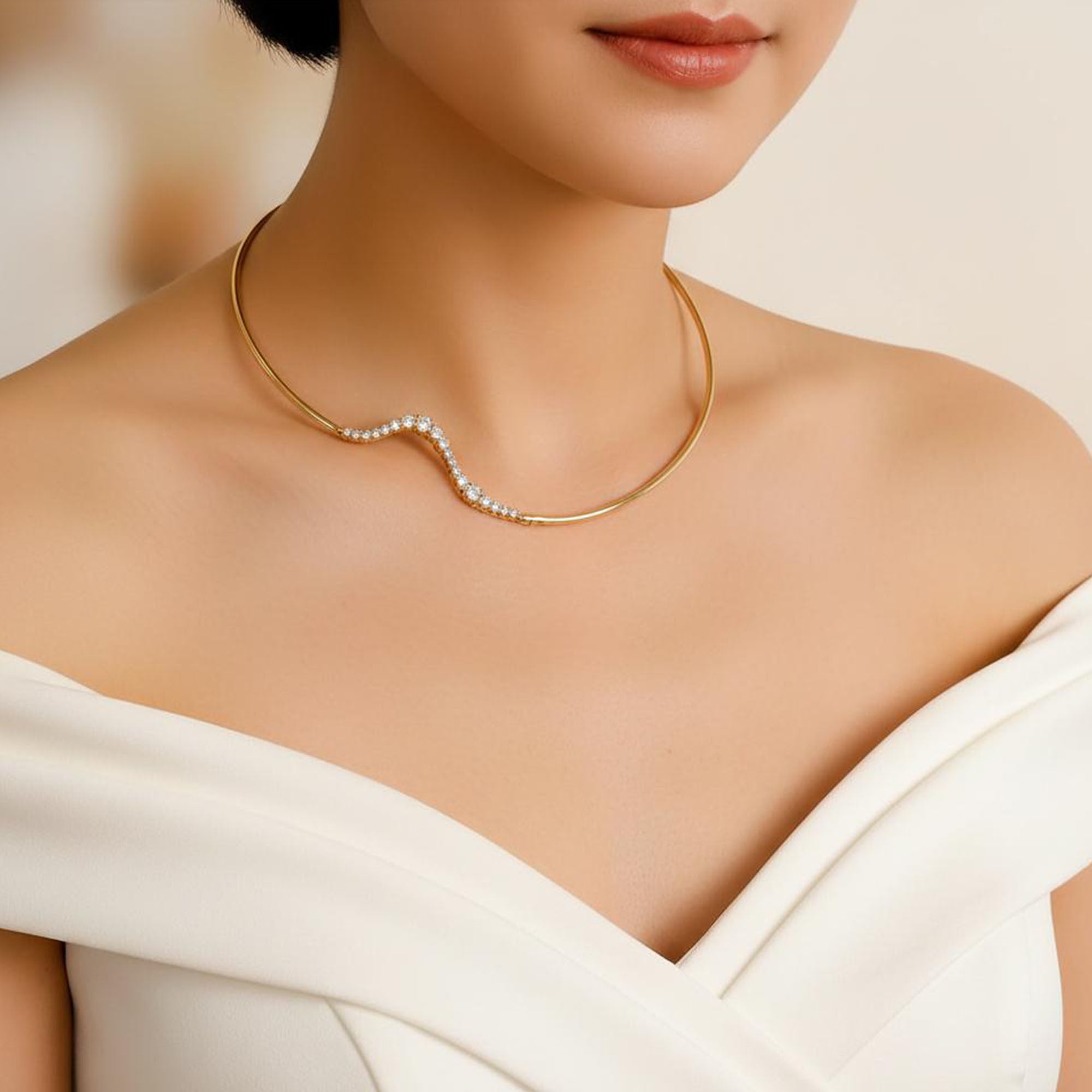 Gold necklace with Diamond worn by a person in a white dress.