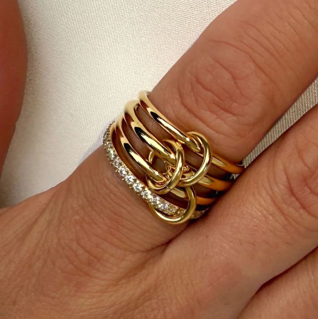 Gold ring set for women with layered band design and crystal stone detailing