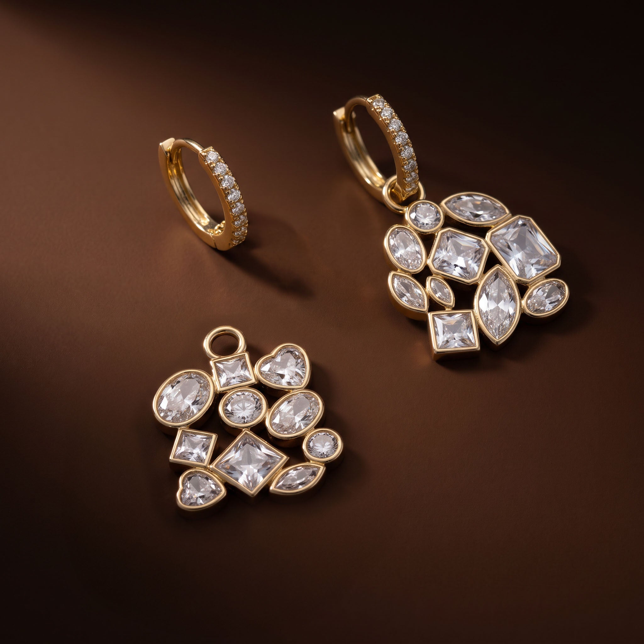 Gold statement earrings for women featuring mixed-shape crystal stones