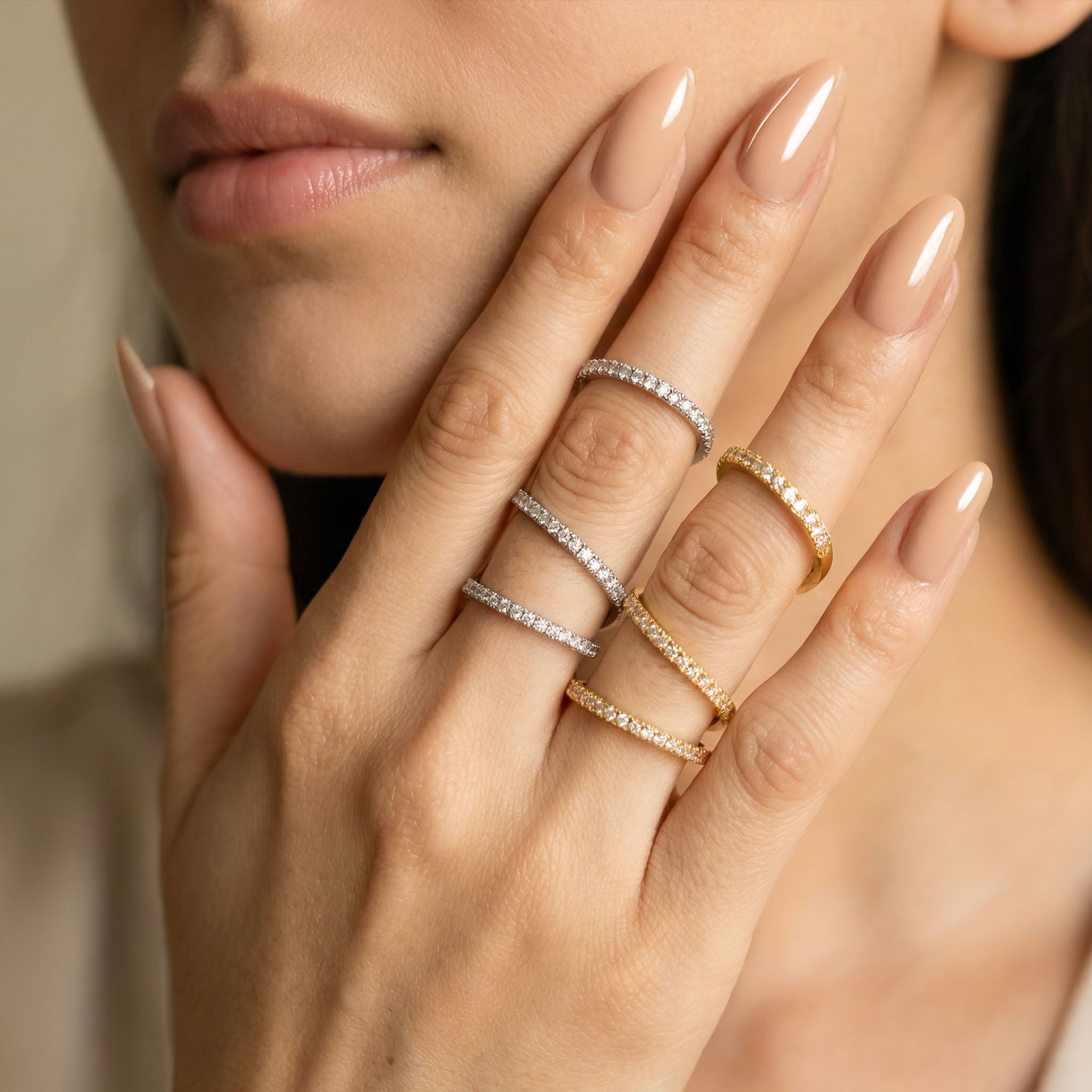Gold and silver ring set for women with slim crystal band design worn on fingers