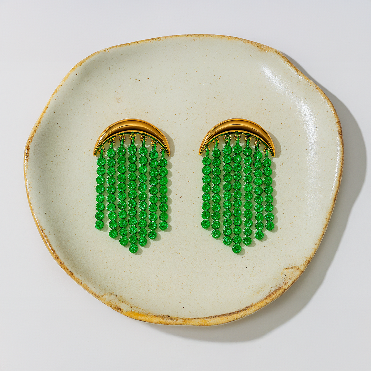 A stunning pair of Christmas green statement earrings for women featuring vibrant beaded detailing and gold accents. Perfect for holiday parties, festive outfits, and Christmas gifting.