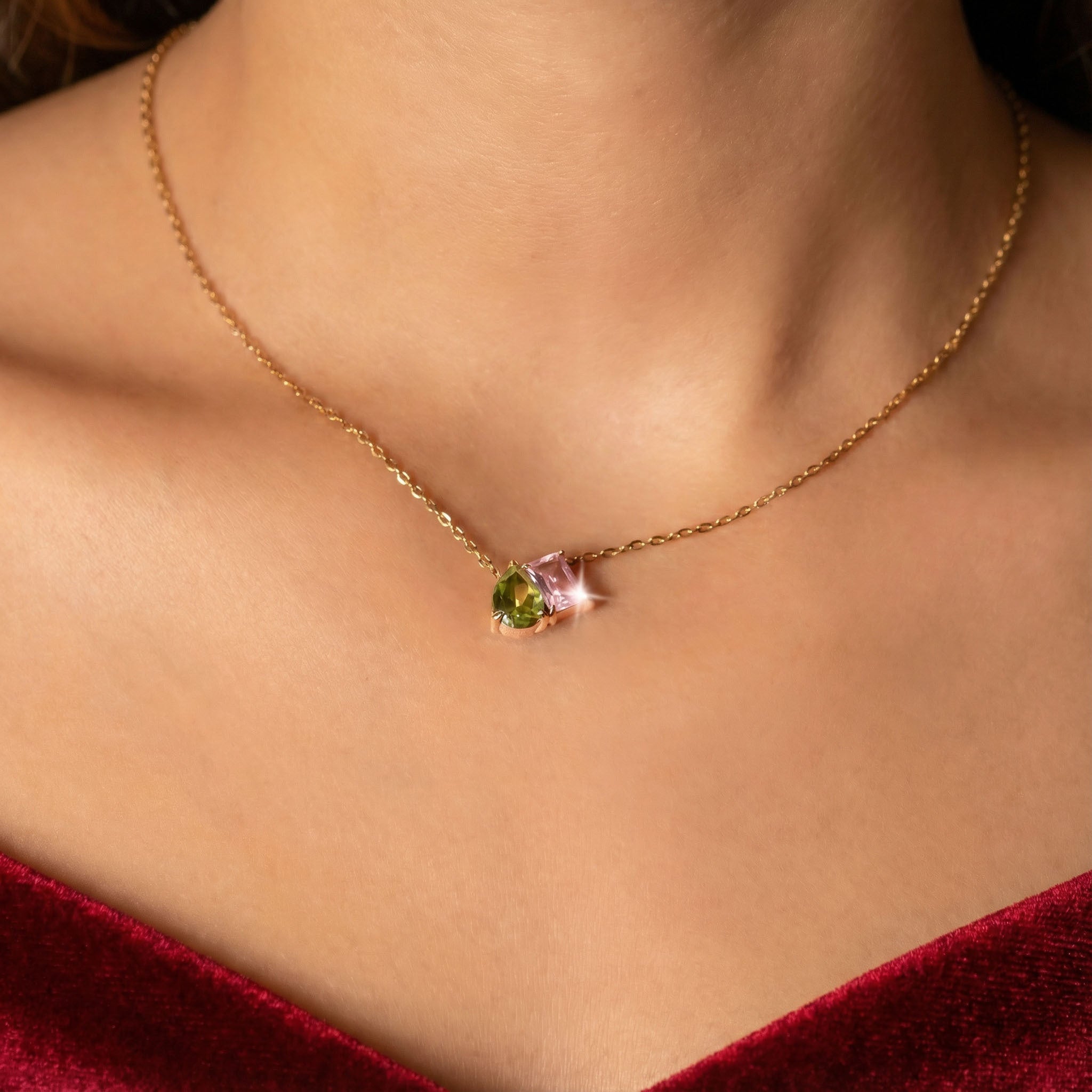 Gold necklace for women with green and pink crystal pendant, minimal everyday necklace close-up