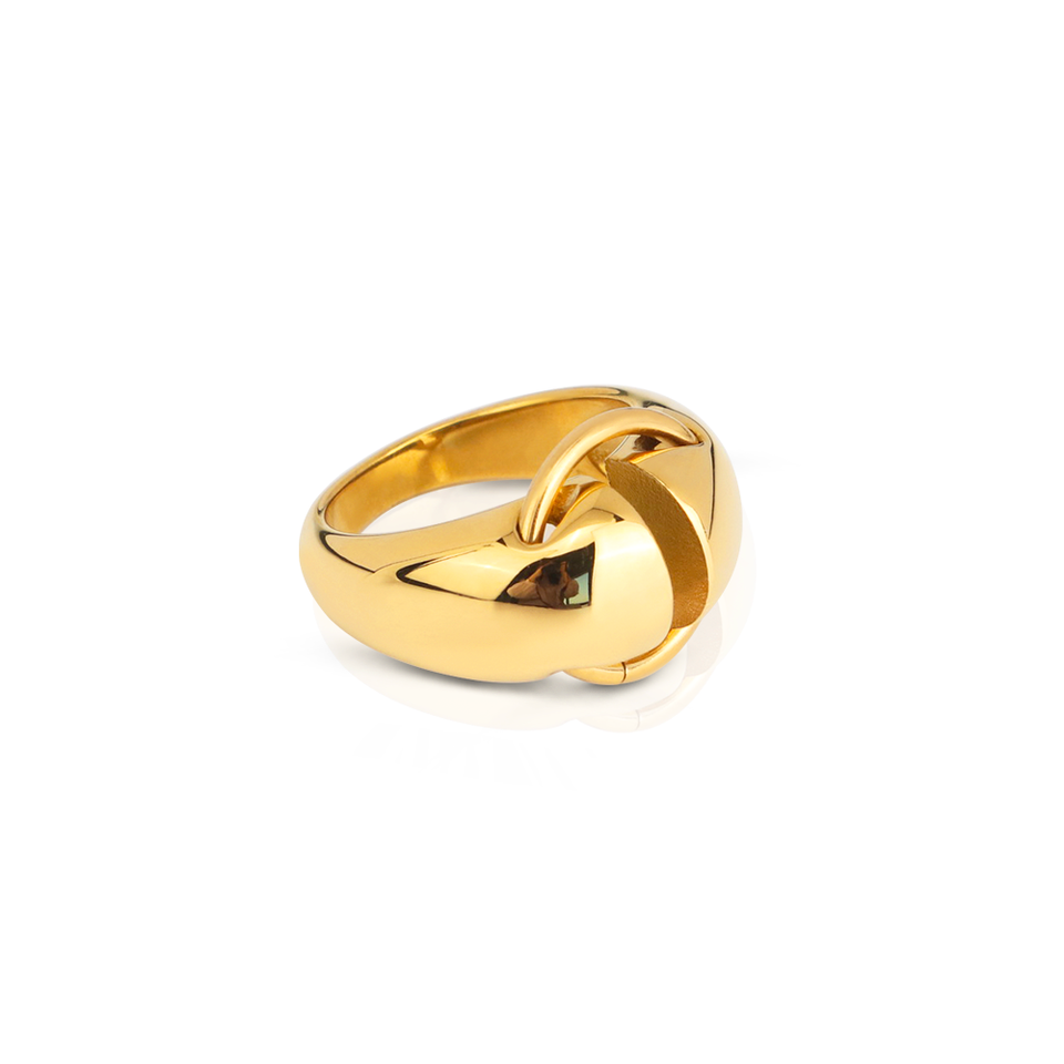 Gold ring with a unique design on a white background