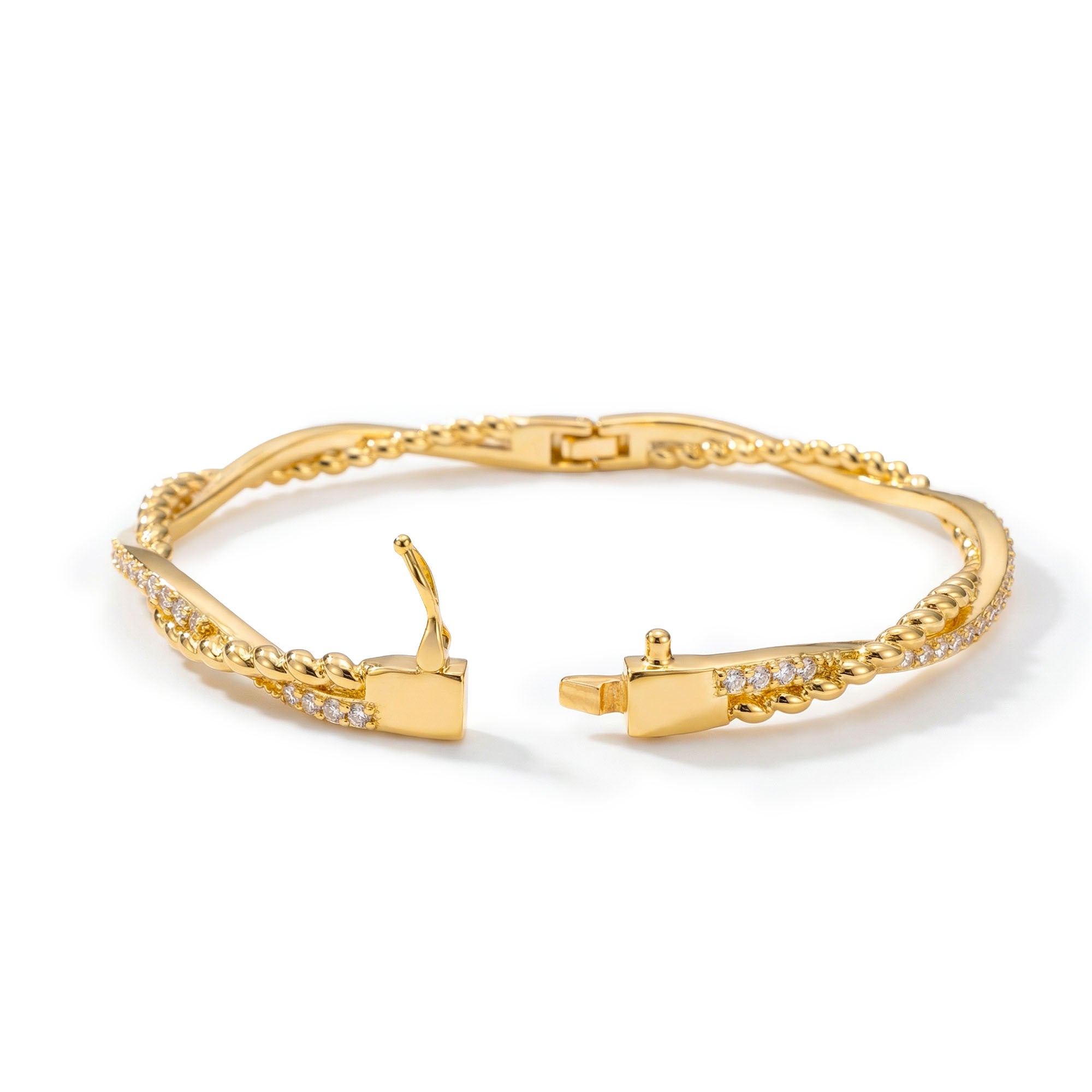 Gold bracelet with diamond accents on a white background
