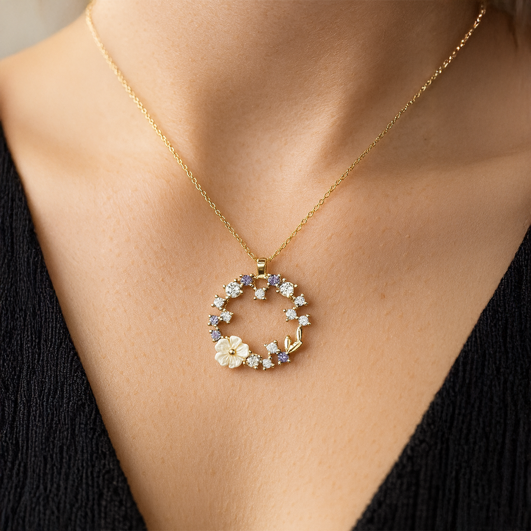 Gold necklace with a circular pendant