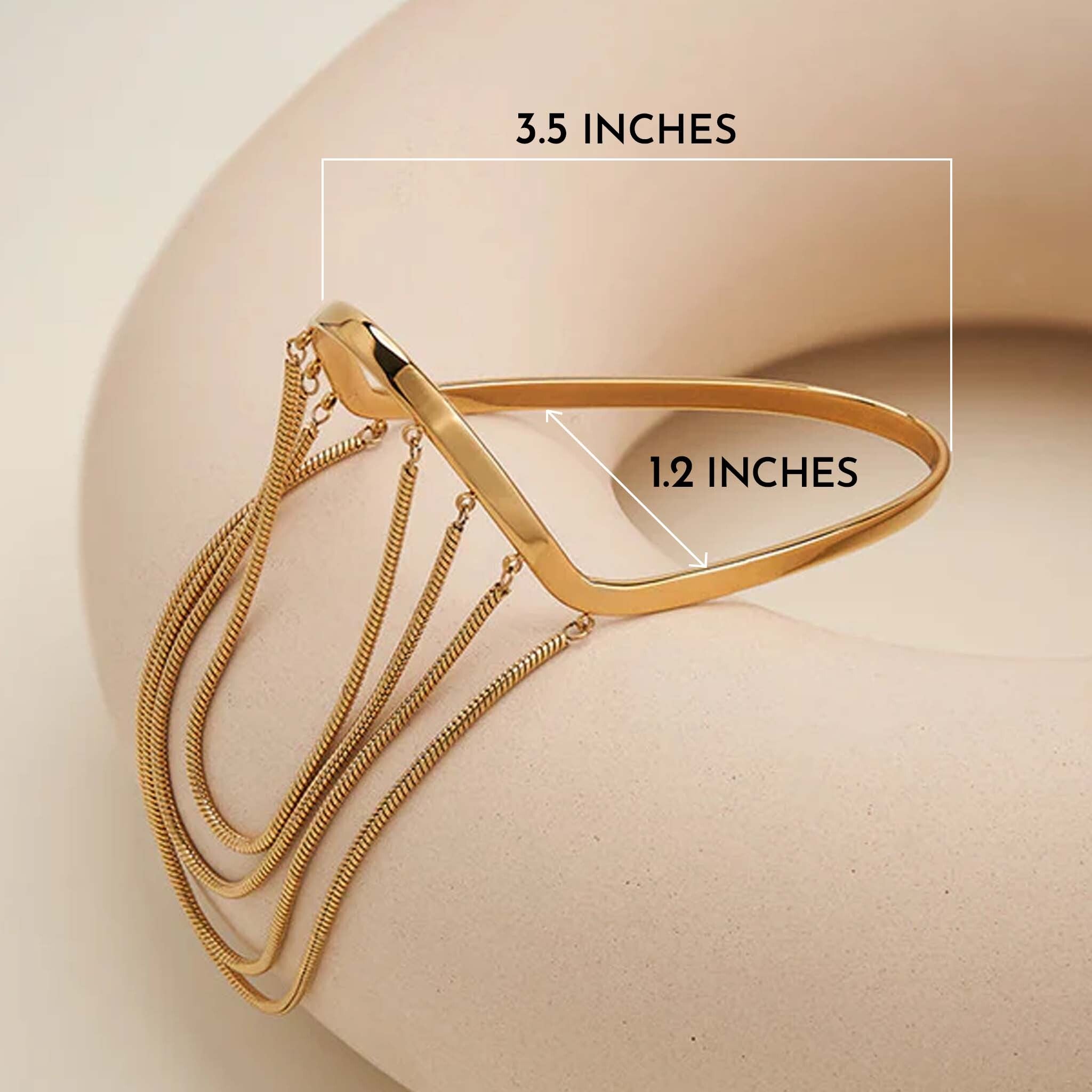 Dimesion of chain bracelet on a beige surface with measurements indicated