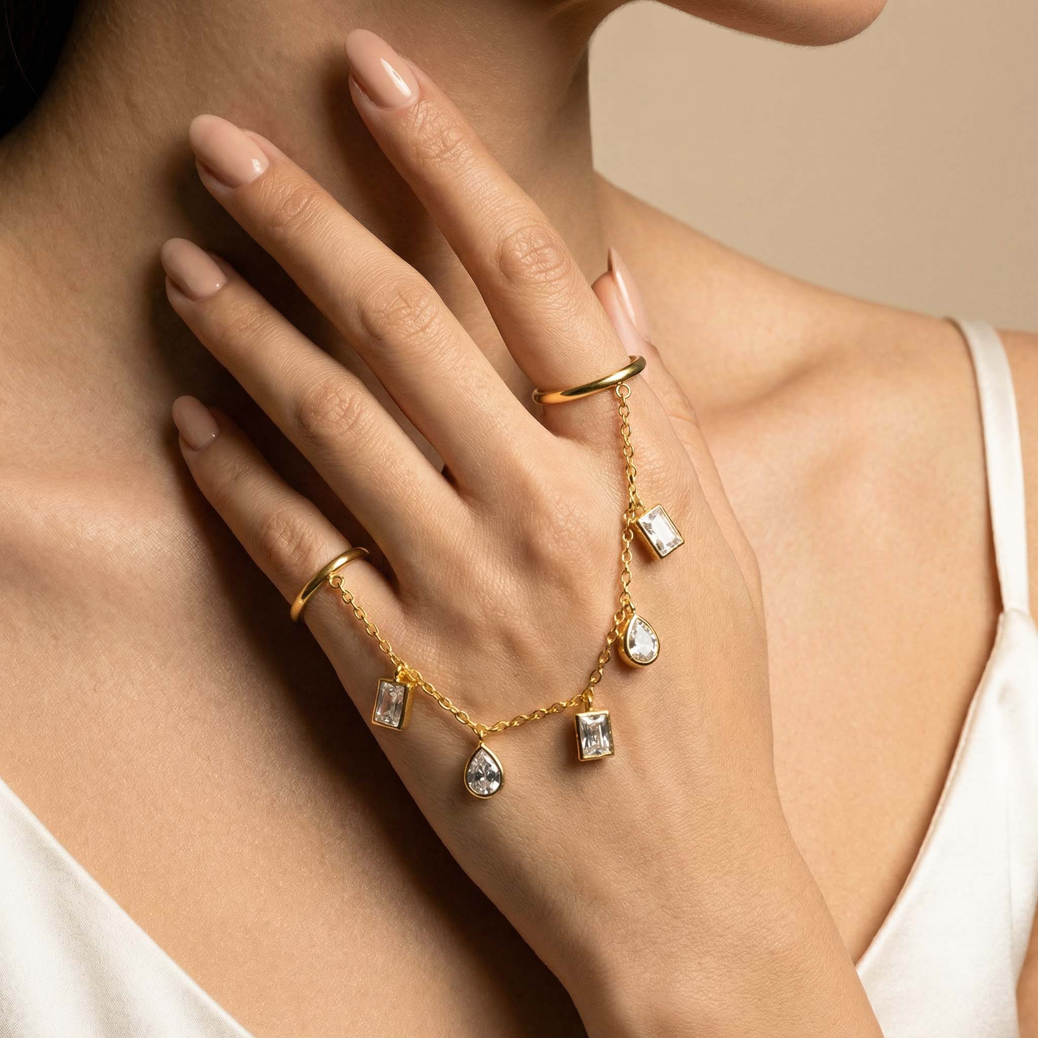 trendy gold hand chain hathphool with geometric crystal charms for women