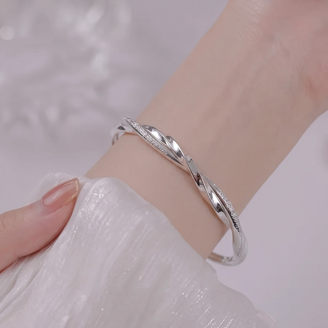 Aurora Twist Stainless Steel Adjustable Bangle
