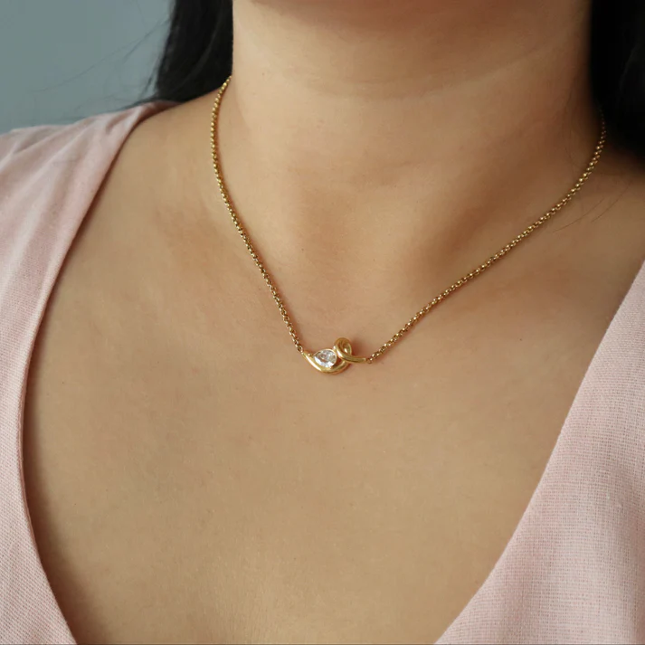 dainty gold necklace for women with heart shape pendant and stone elegant design