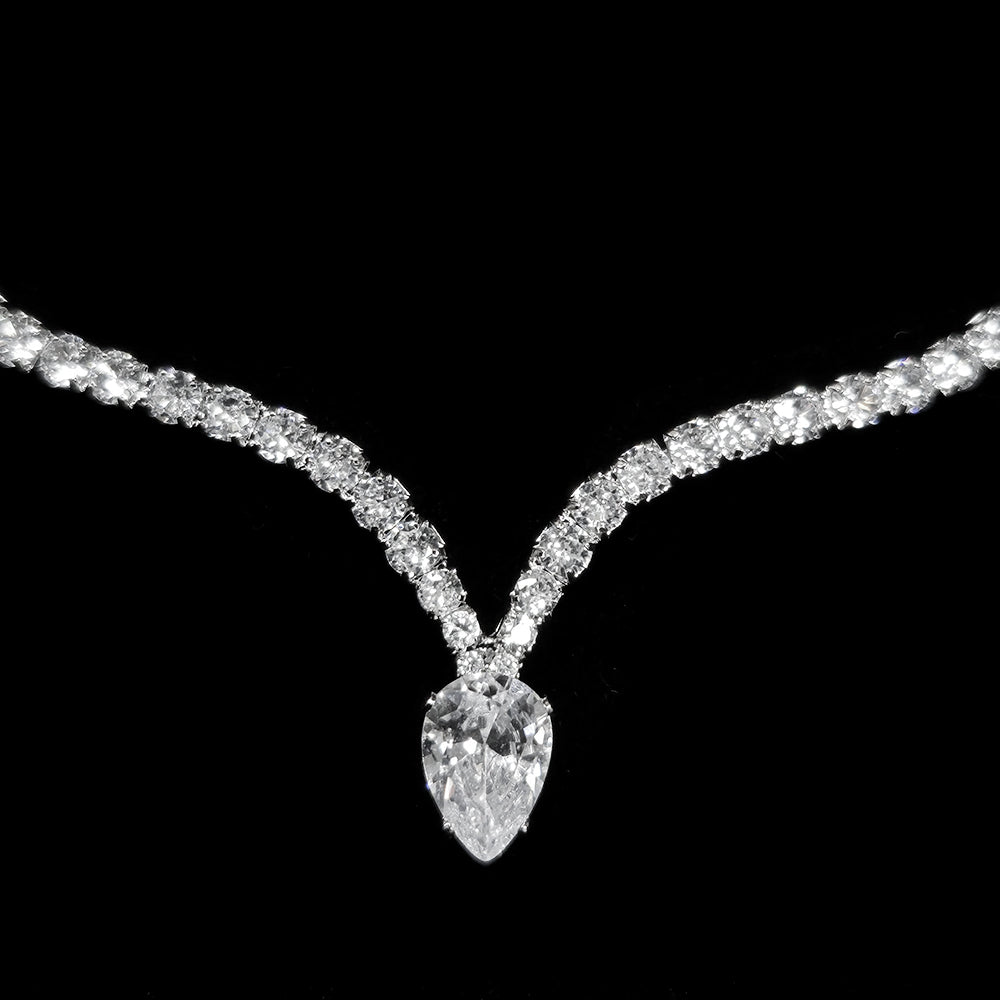 Diamond necklace with a heart-shaped pendant on a black background