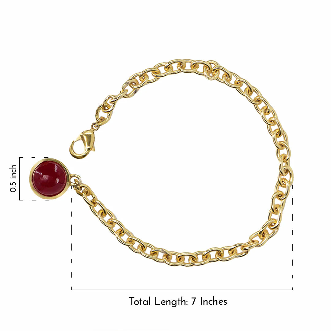 Gold bracelet with a red gemstone and measurements