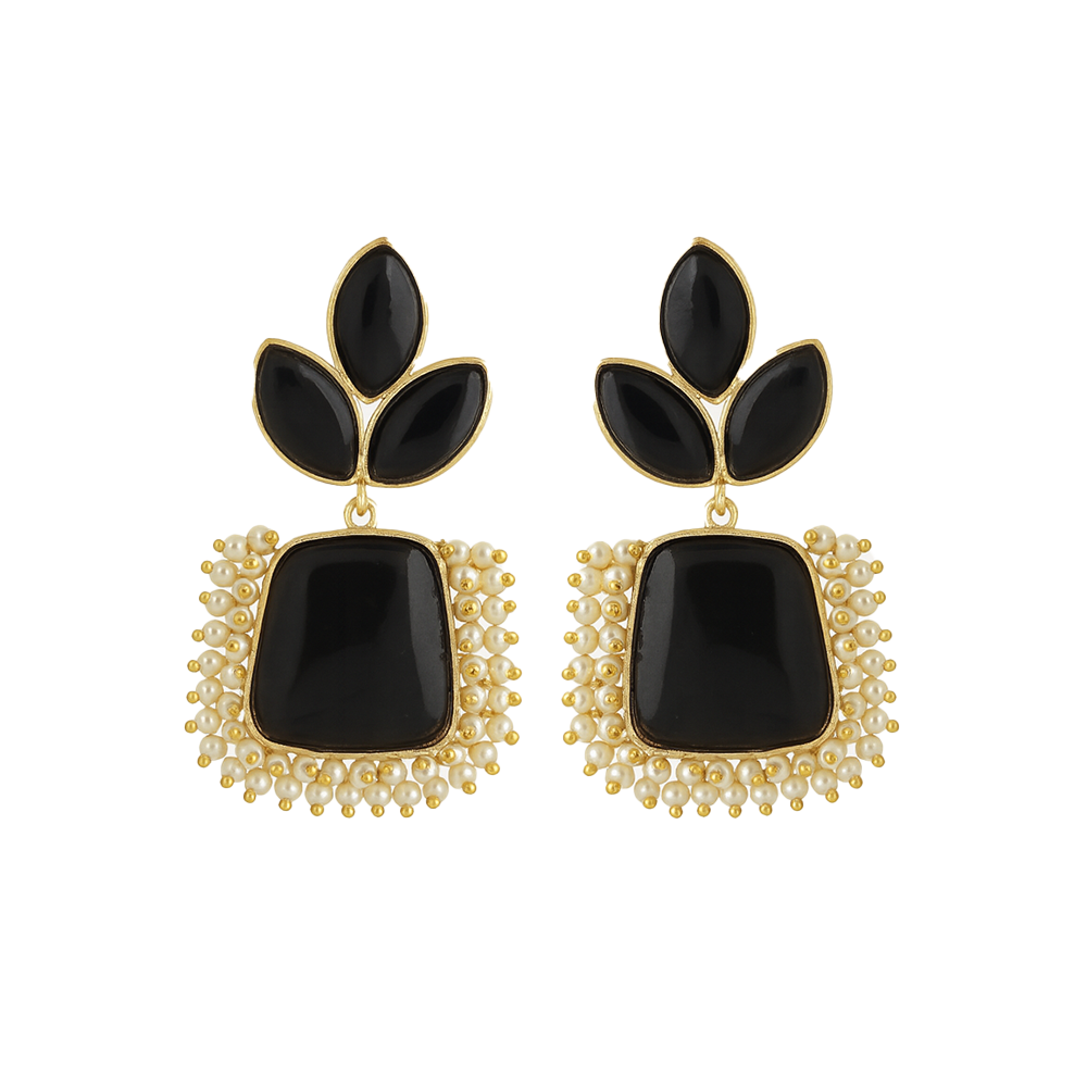 Pair of earrings with black stones and gold accents on a white background