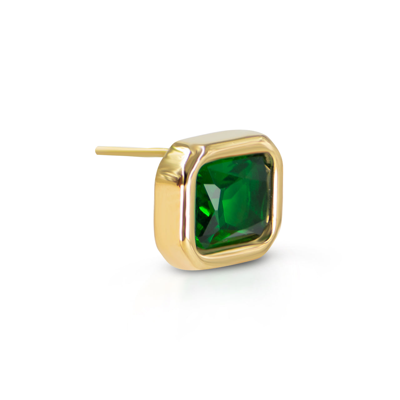 Gold earring with a green gemstone