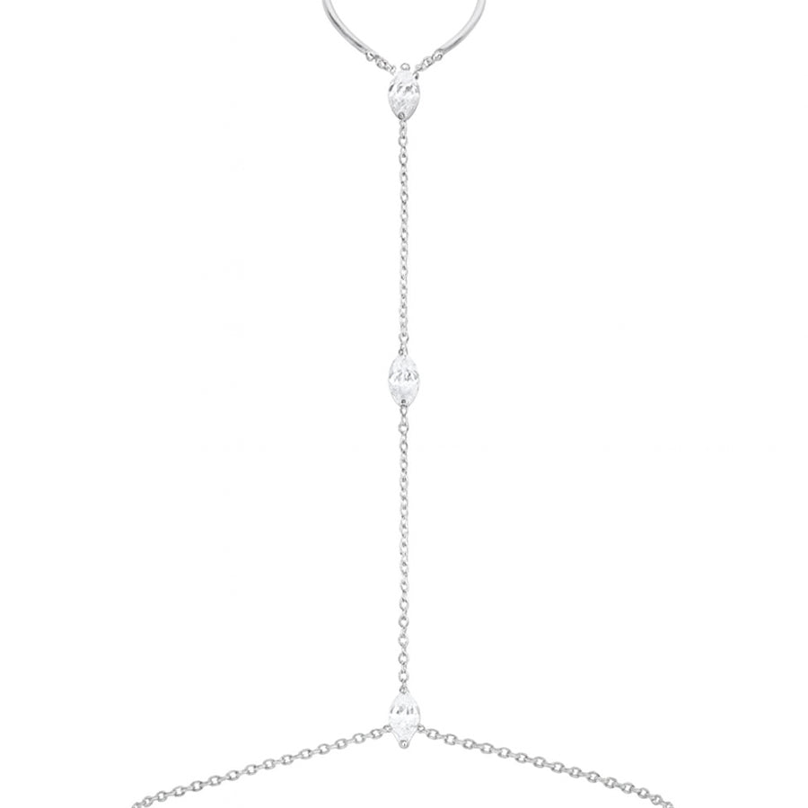 Silver hand chain bracelet with crystal accents connecting ring and wrist for women