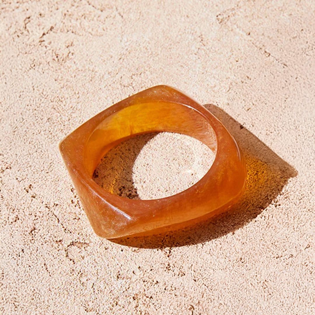 Brown Kada on a sandy surface