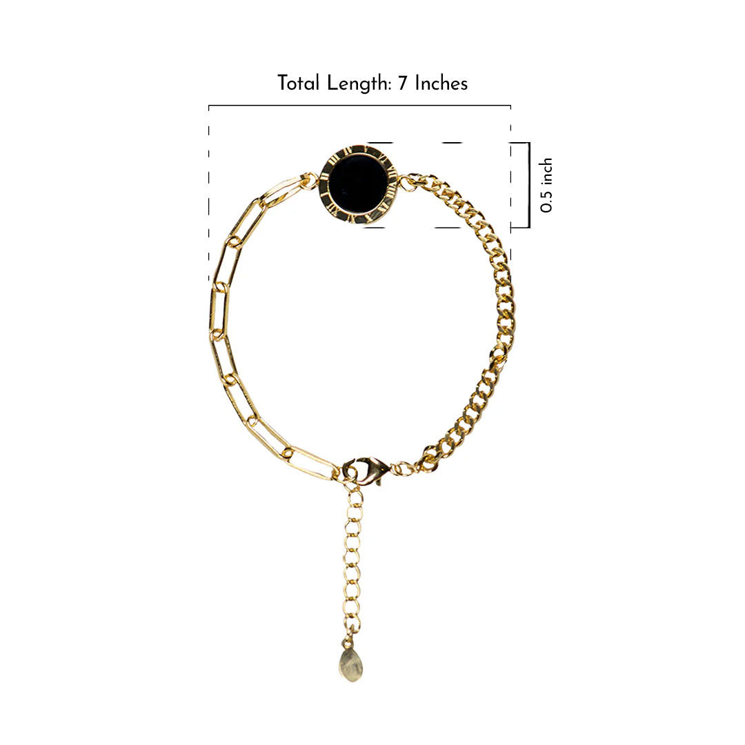 Gold bracelet with a black center stone