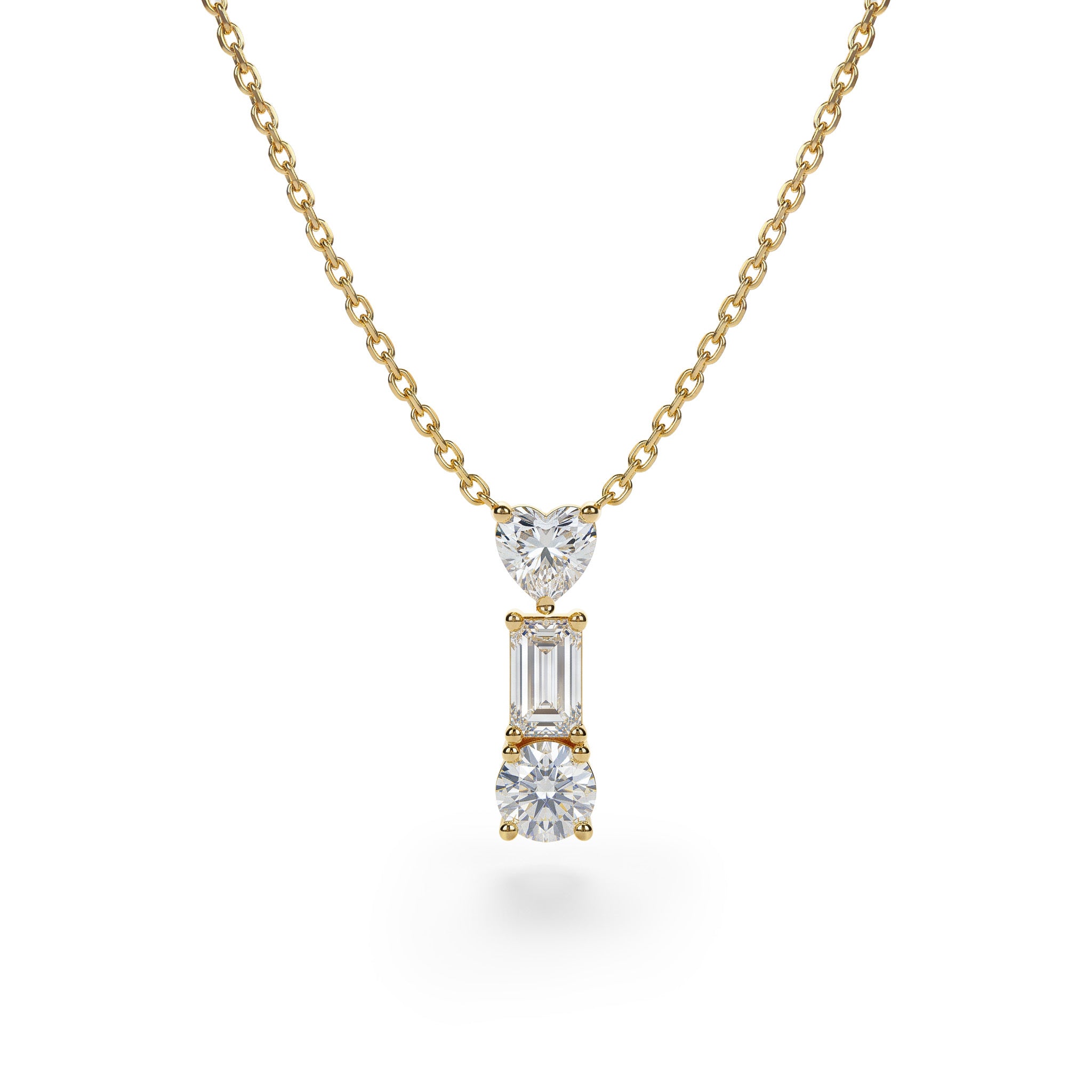 Gold necklace with three diamond pendants on a white background