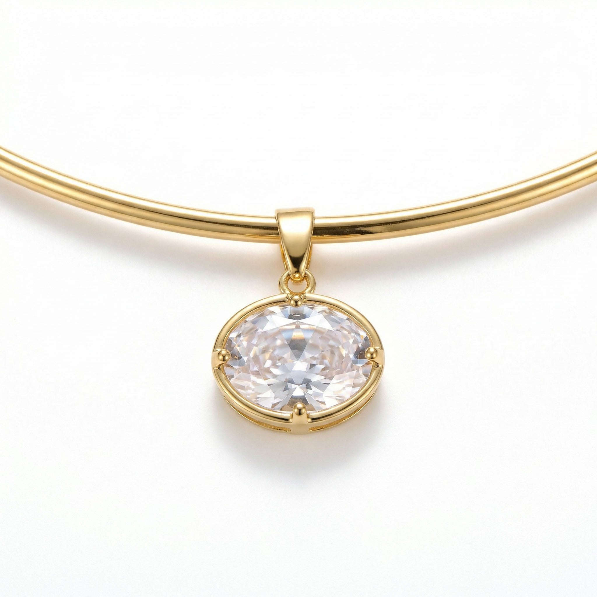 Gold necklace for women with a clear gemstone pendant on a white background
