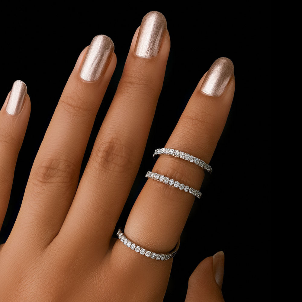 Open silver ring with crystal accents and modern wave design for women