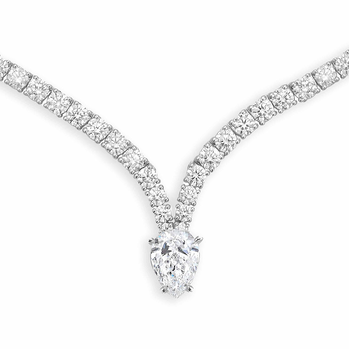 Diamond necklace with a pear-shaped center stone on a white background