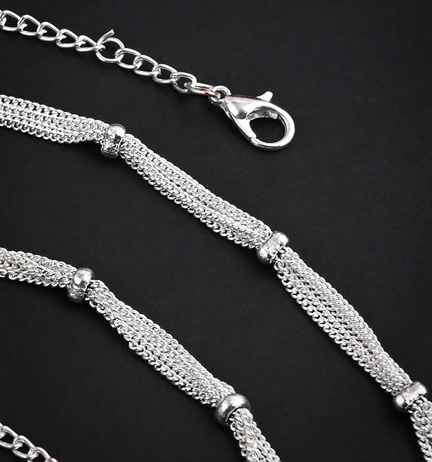 Silver chain st on a black background