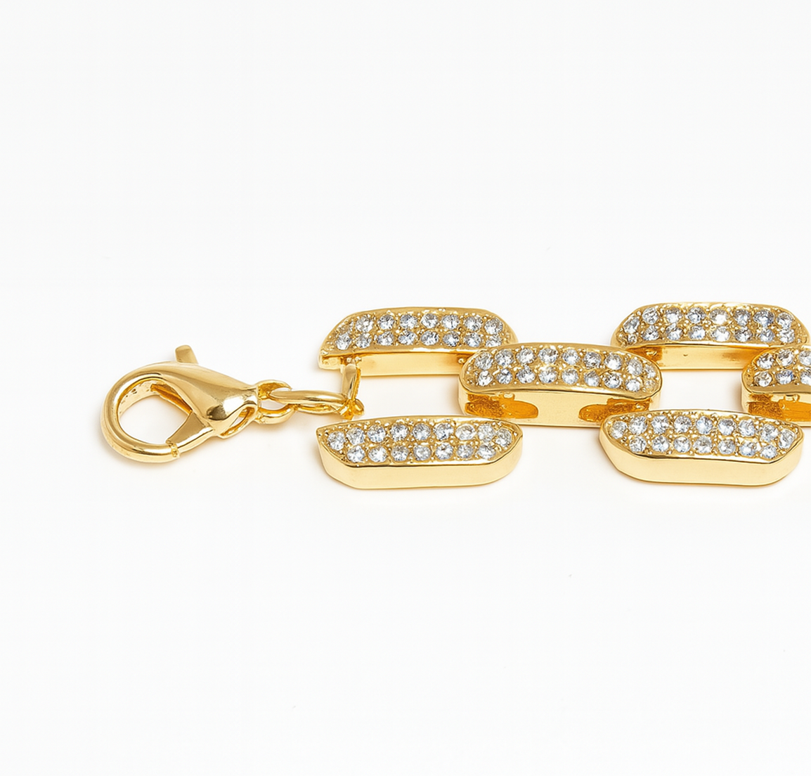 Gold chain necklaces for women with diamond-like stones on a white background
