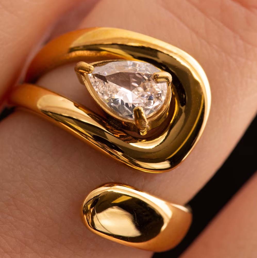 designer gold ring with crystal stone bold statement ring for party and festive wear