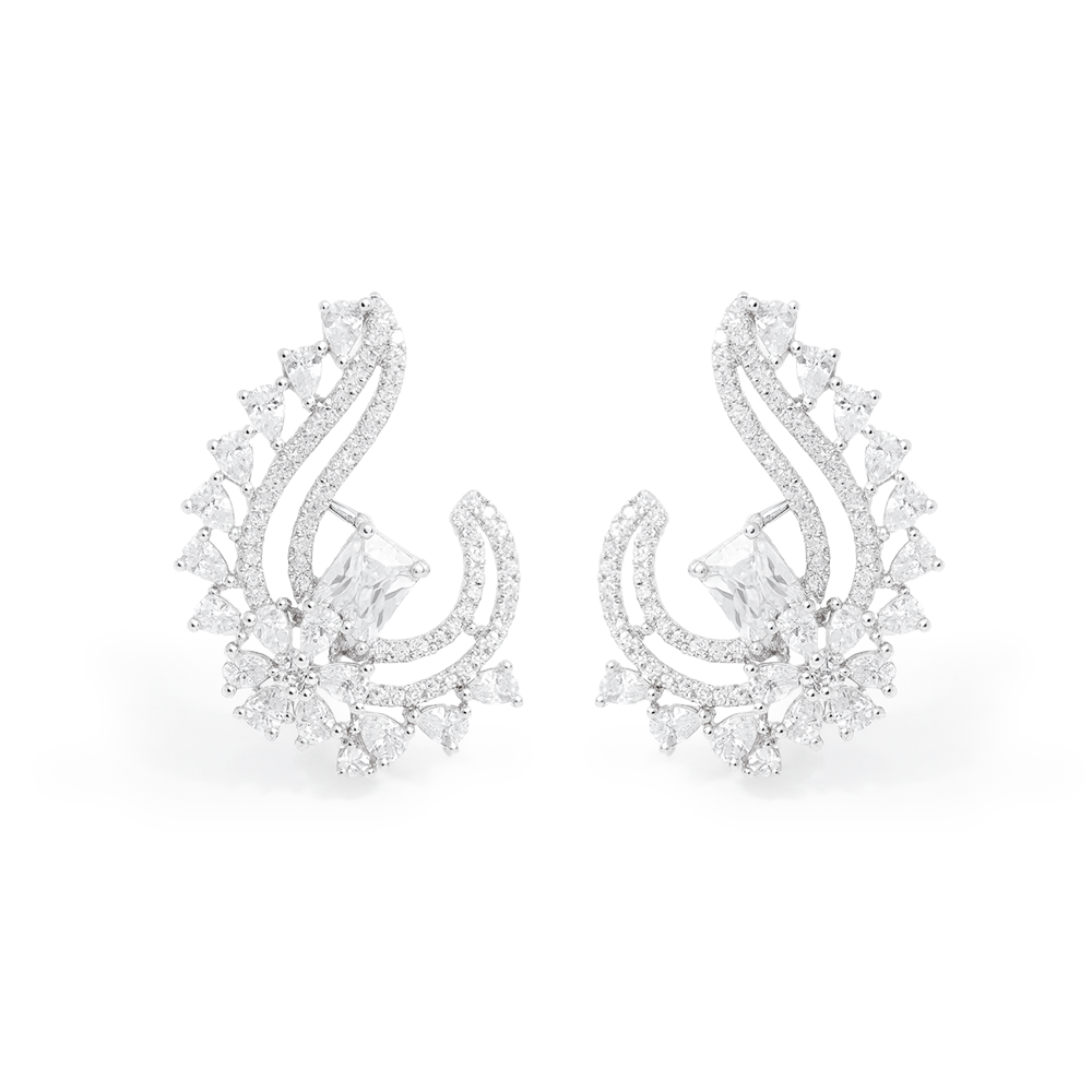 Pair of silver earrings with diamond-like stones on a white background