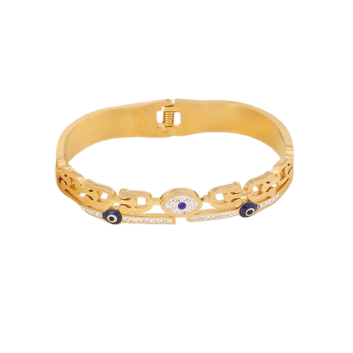 Gold bracelet with blue evil eye charms on a white background
