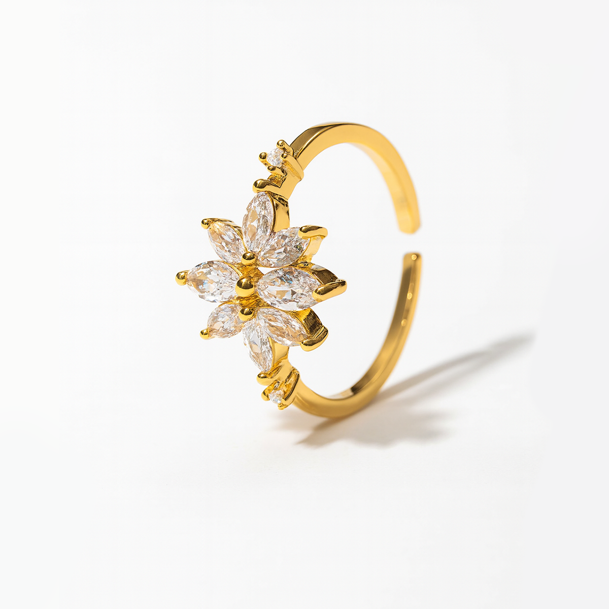 Gold daily wear ring for women with small crystal flower design