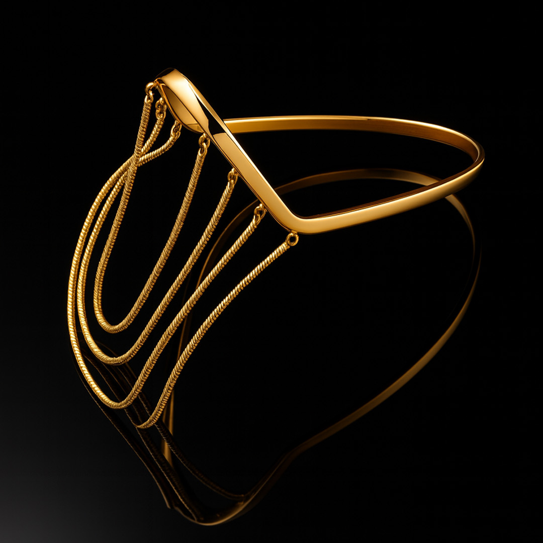 Gold hand harness bracelet for women with layered chain drape design