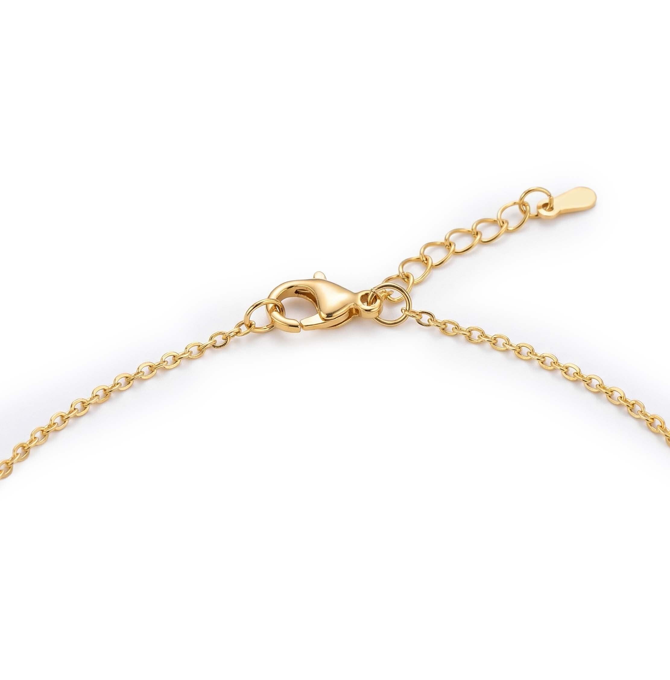 Gold chain neckalces for women on a white background