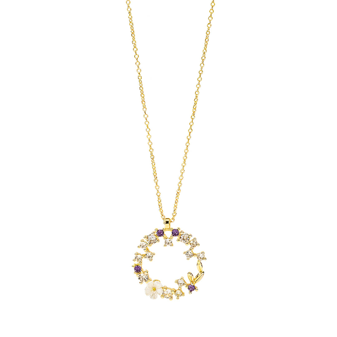 Gold necklace with a circular pendant 