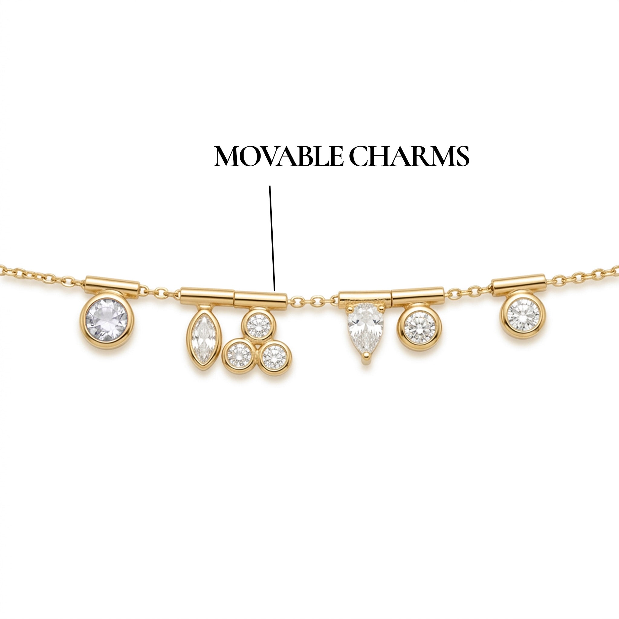 Gold necklace with movable charms on a white background