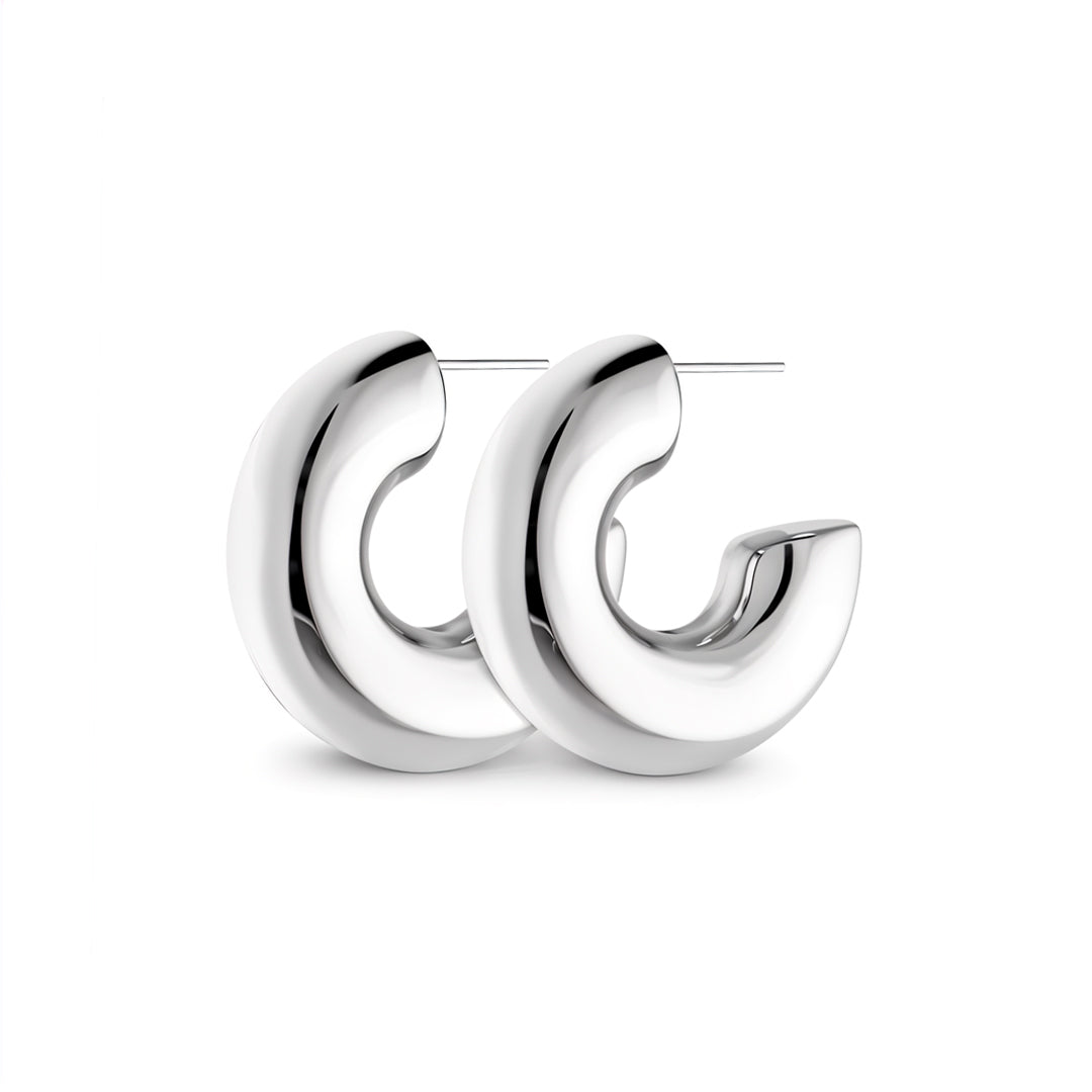 Silver hoop earrings on a white background