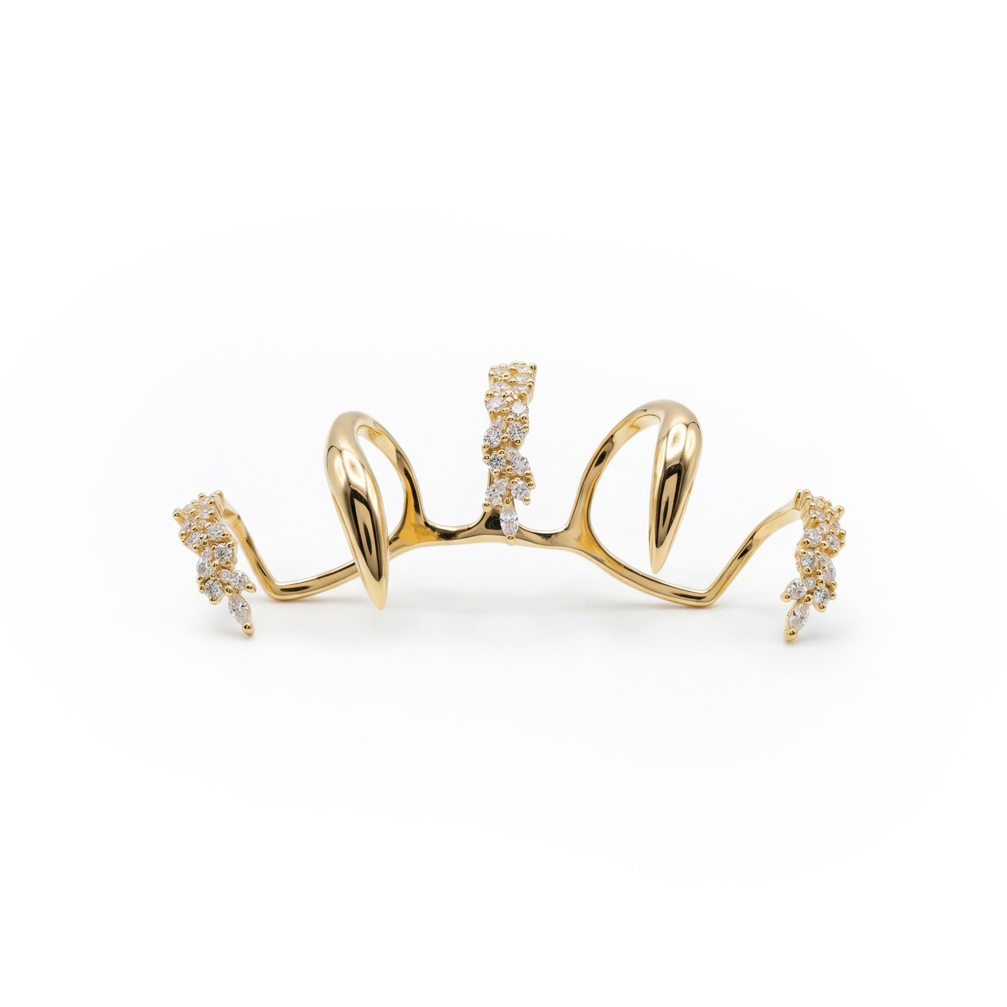 Gold  Knuckle Ring with diamond accents on a white background