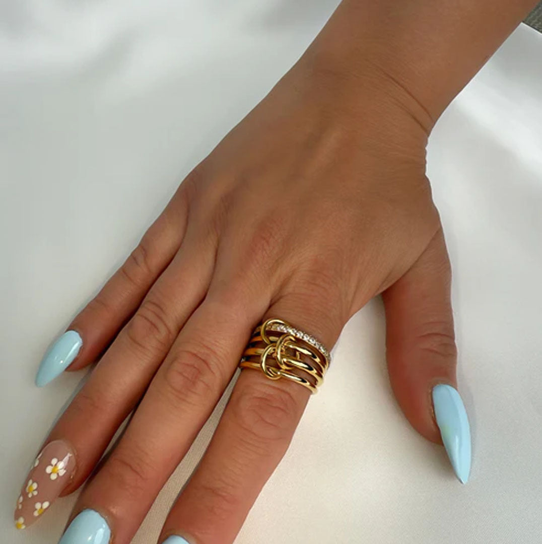 Minimal gold ring set for women with simple layered band and crystal strip