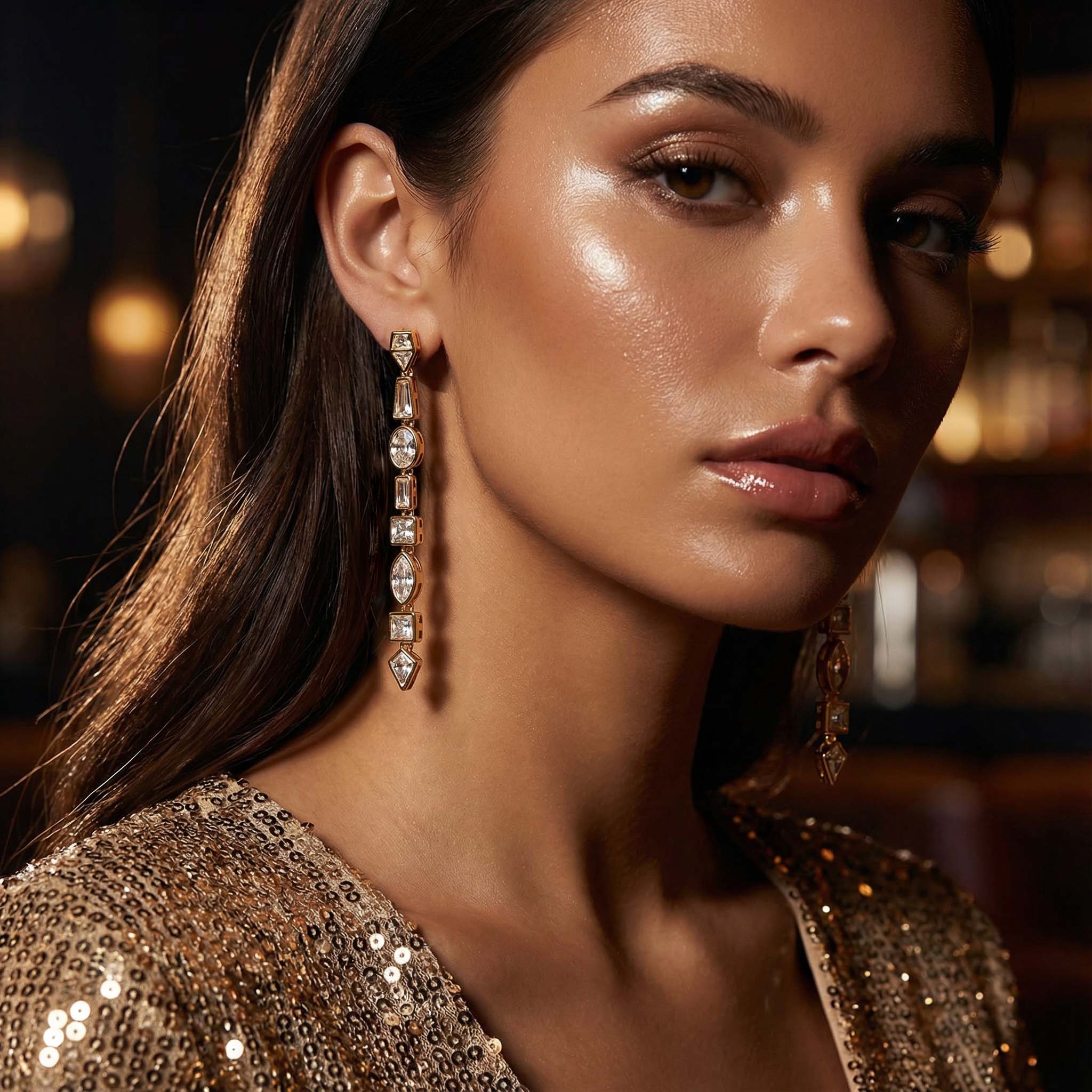 Close-up of a woman wearing sparkling earrings with a blurred background