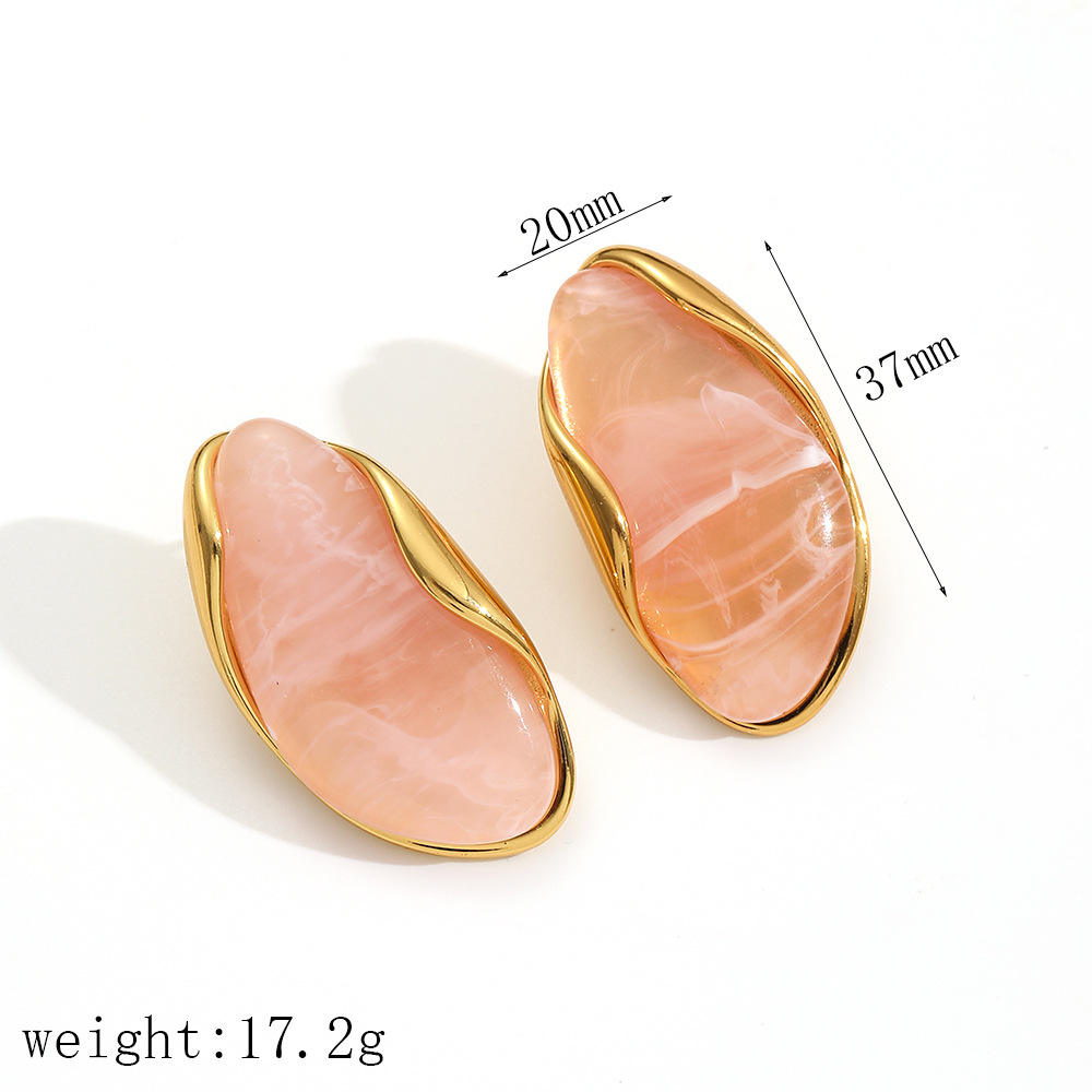 Pair of earrings with pink stones and gold accents, shown with measurements on a white background.