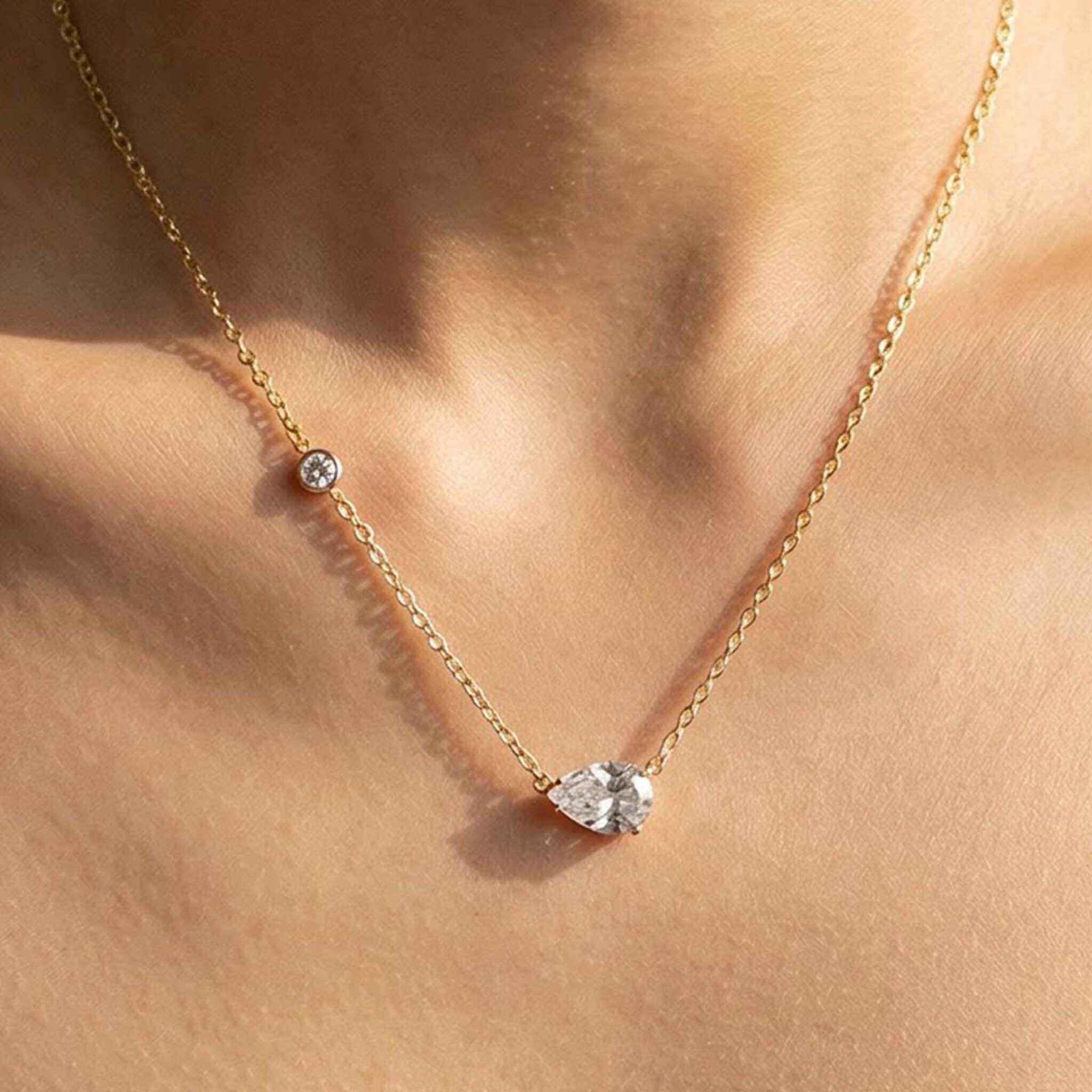 Clear crystal necklace with gold chain