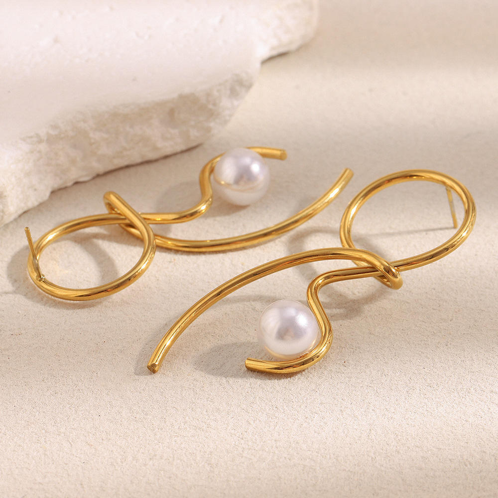 stylish gold pearl dangler earrings for women unique artistic loop design jewelry